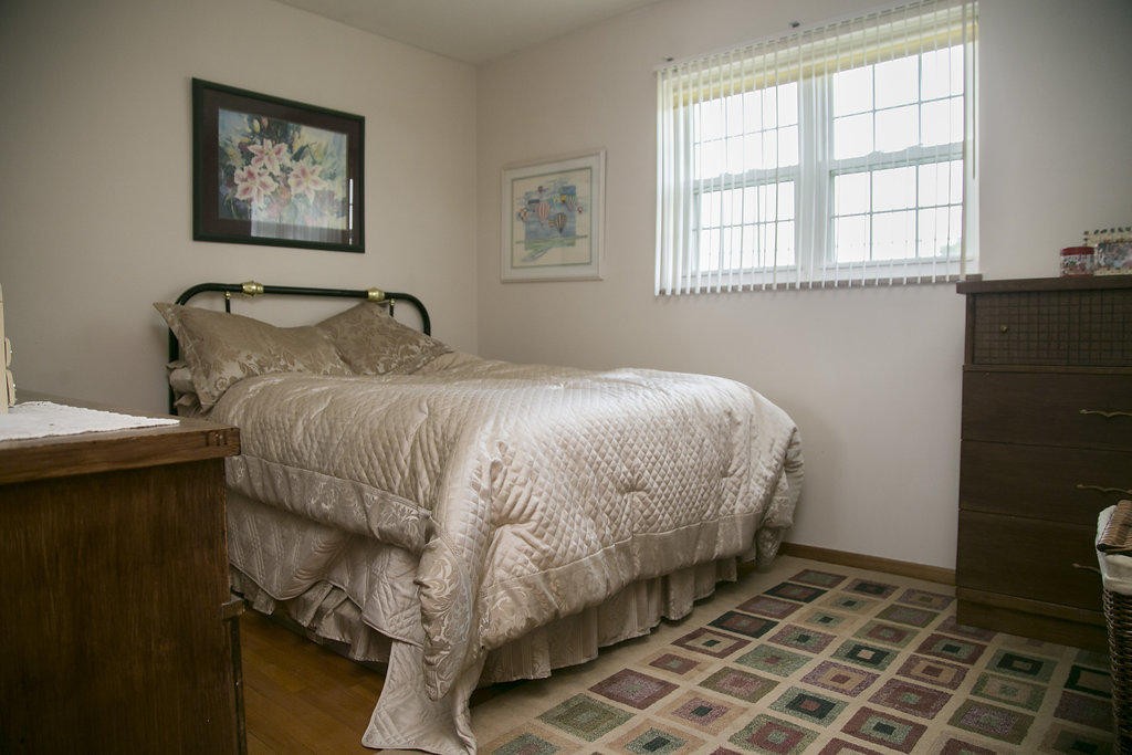 4405 Royalview Road Knoxville, TN 37921 - Photo 32 of 38 a bedroom with a bed and a window