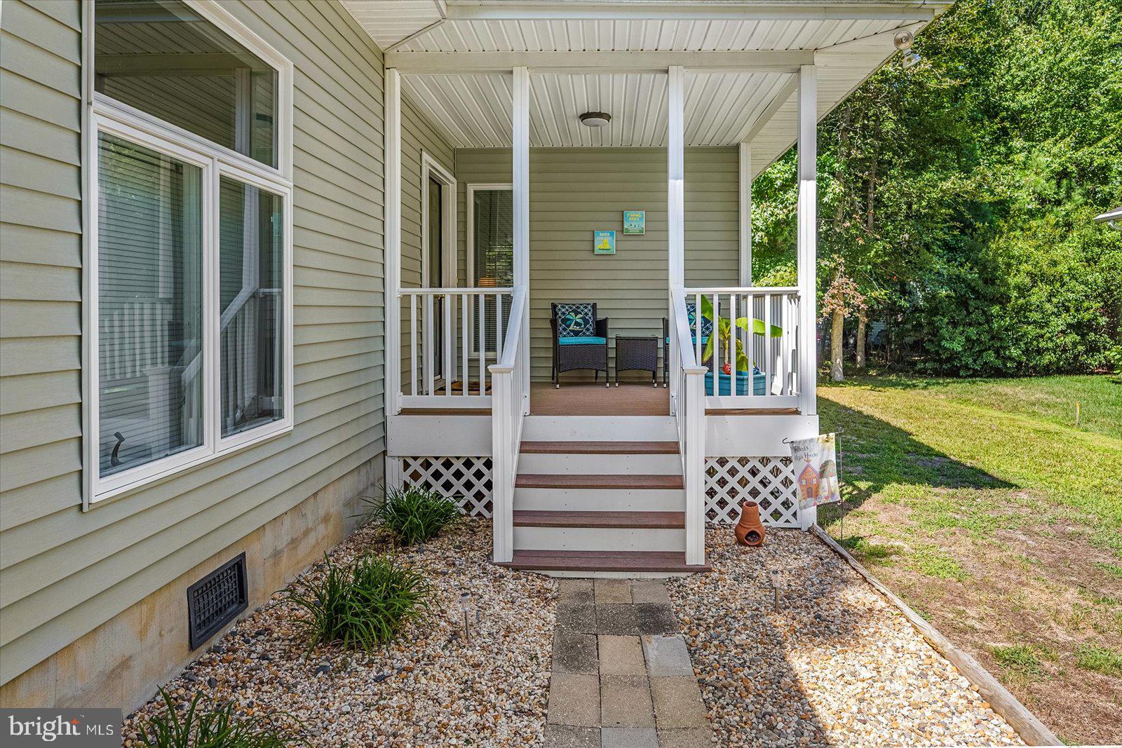 91 Robin Hood Trail Ocean Pines, MD 21811 - Photo 2 of 71 a view of a house with a yard