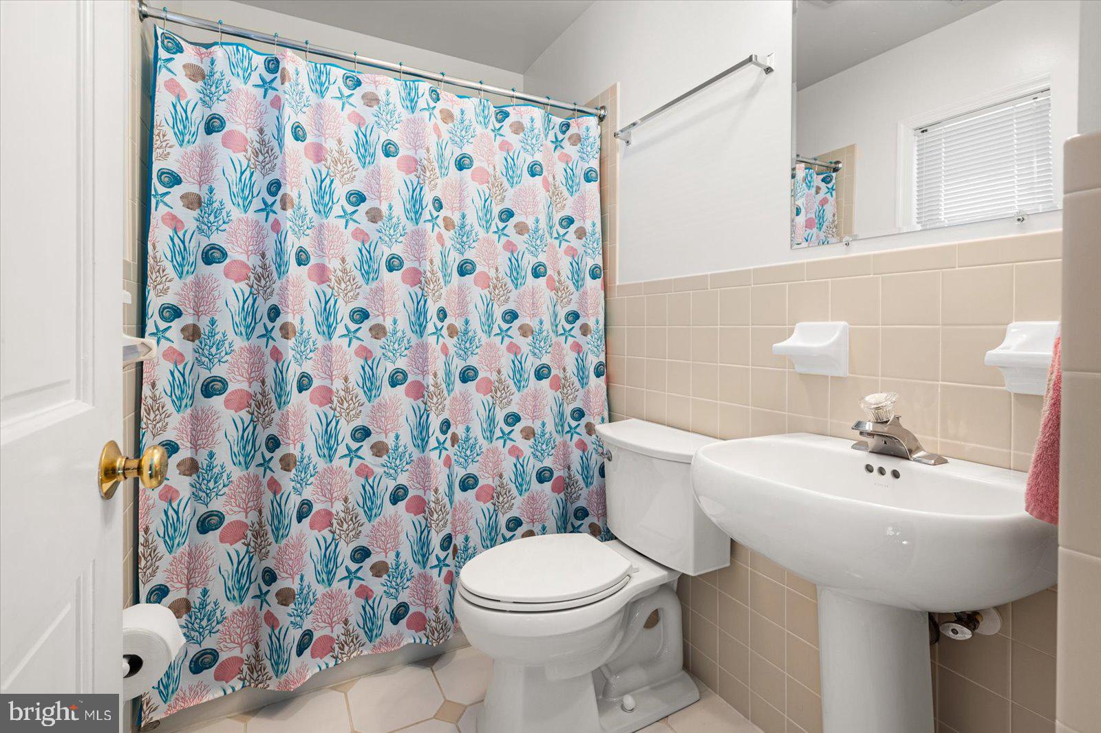 91 Robin Hood Trail Ocean Pines, MD 21811 - Photo 27 of 71 a bathroom with a sink toilet and shower