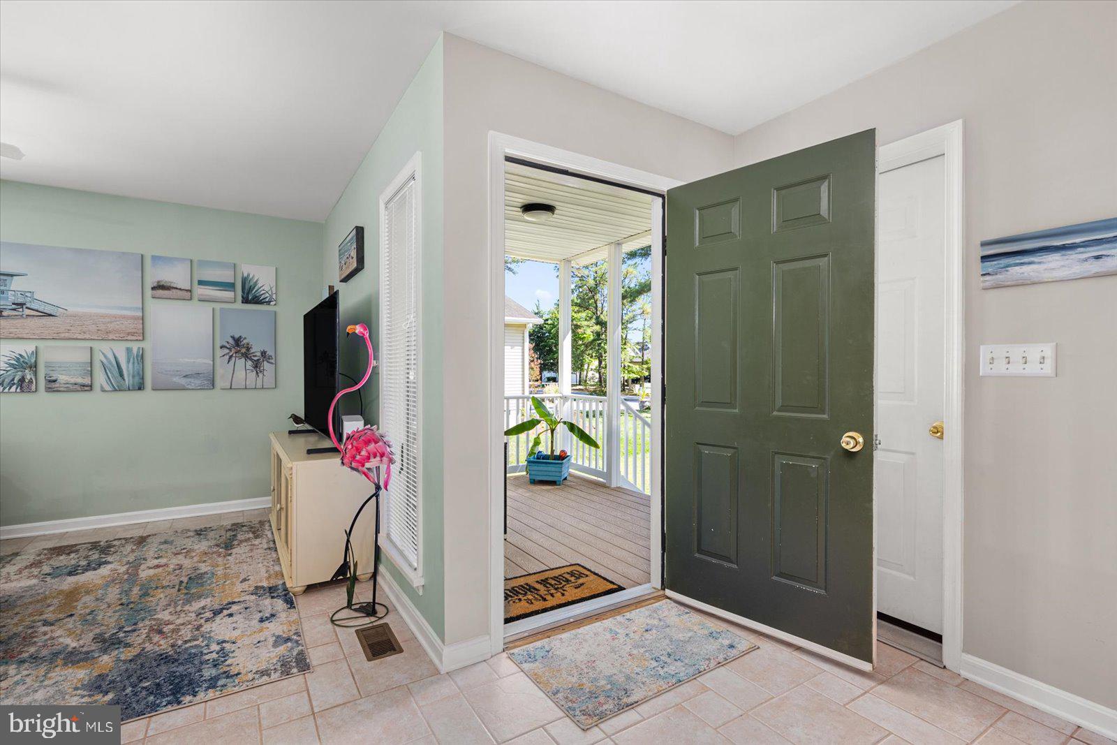 91 Robin Hood Trail Ocean Pines, MD 21811 - Photo 4 of 71 a living room with a couch and a shower