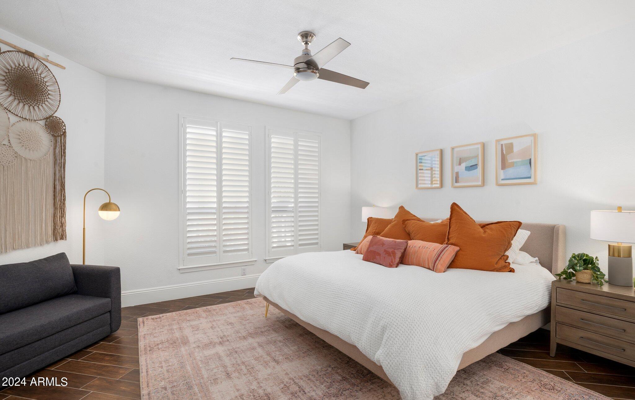 7705 East Doubletree Ranch Road, Unit 38 Scottsdale, AZ 85258 - Photo 13 of 31 a bedroom with bed and window