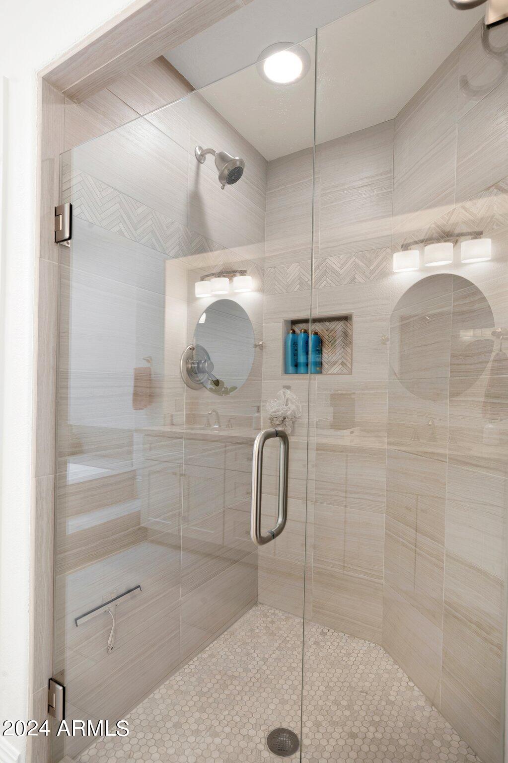 7705 East Doubletree Ranch Road, Unit 38 Scottsdale, AZ 85258 - Photo 17 of 31 a bathroom with a shower