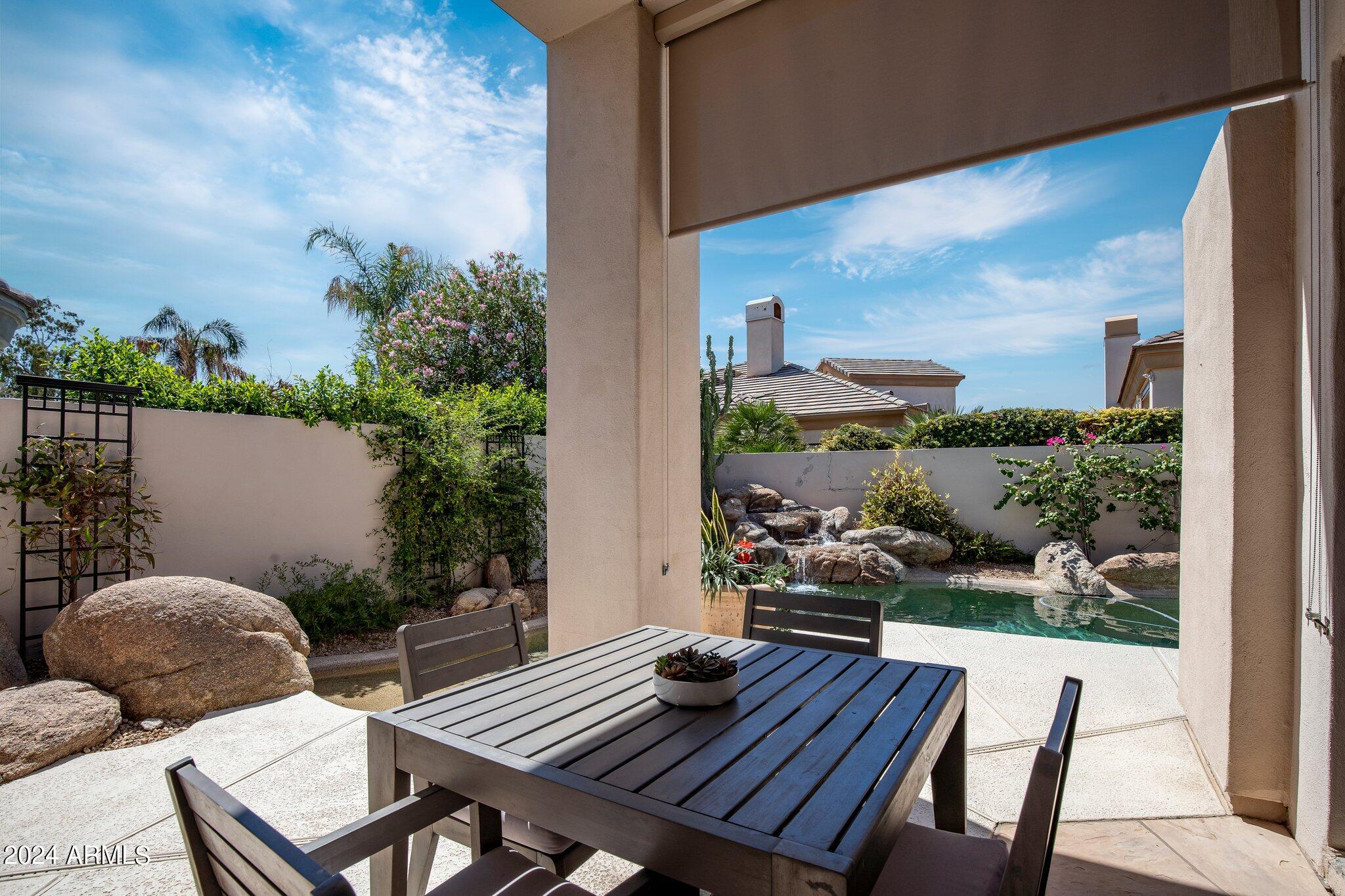 7705 East Doubletree Ranch Road, Unit 38 Scottsdale, AZ 85258 - Photo 25 of 31 a view of a outdoor seating area with furniture
