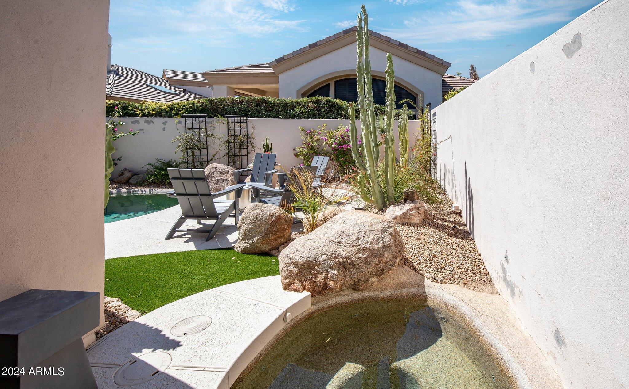 7705 East Doubletree Ranch Road, Unit 38 Scottsdale, AZ 85258 - Photo 28 of 31 a view of a small yard