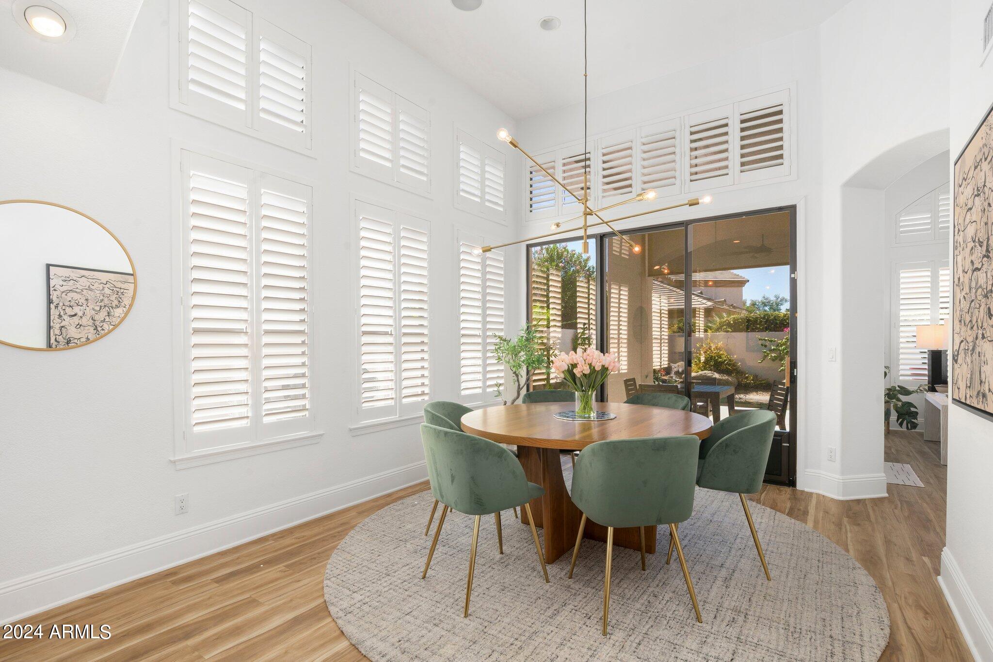 7705 East Doubletree Ranch Road, Unit 38 Scottsdale, AZ 85258 - Photo 6 of 31 a dining room with furniture and window