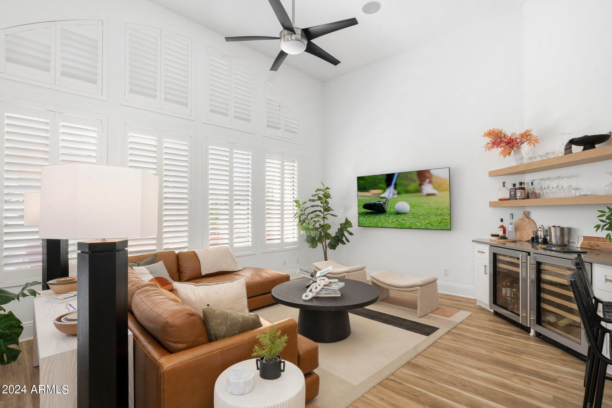 7705 East Doubletree Ranch Road, Unit 38 Scottsdale, AZ 85258 - Photo 8 of 31 a living room with furniture and a window