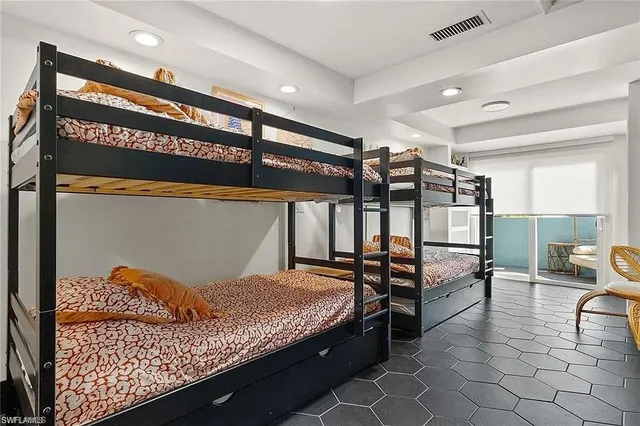 a bedroom with a bed and a walk in closet