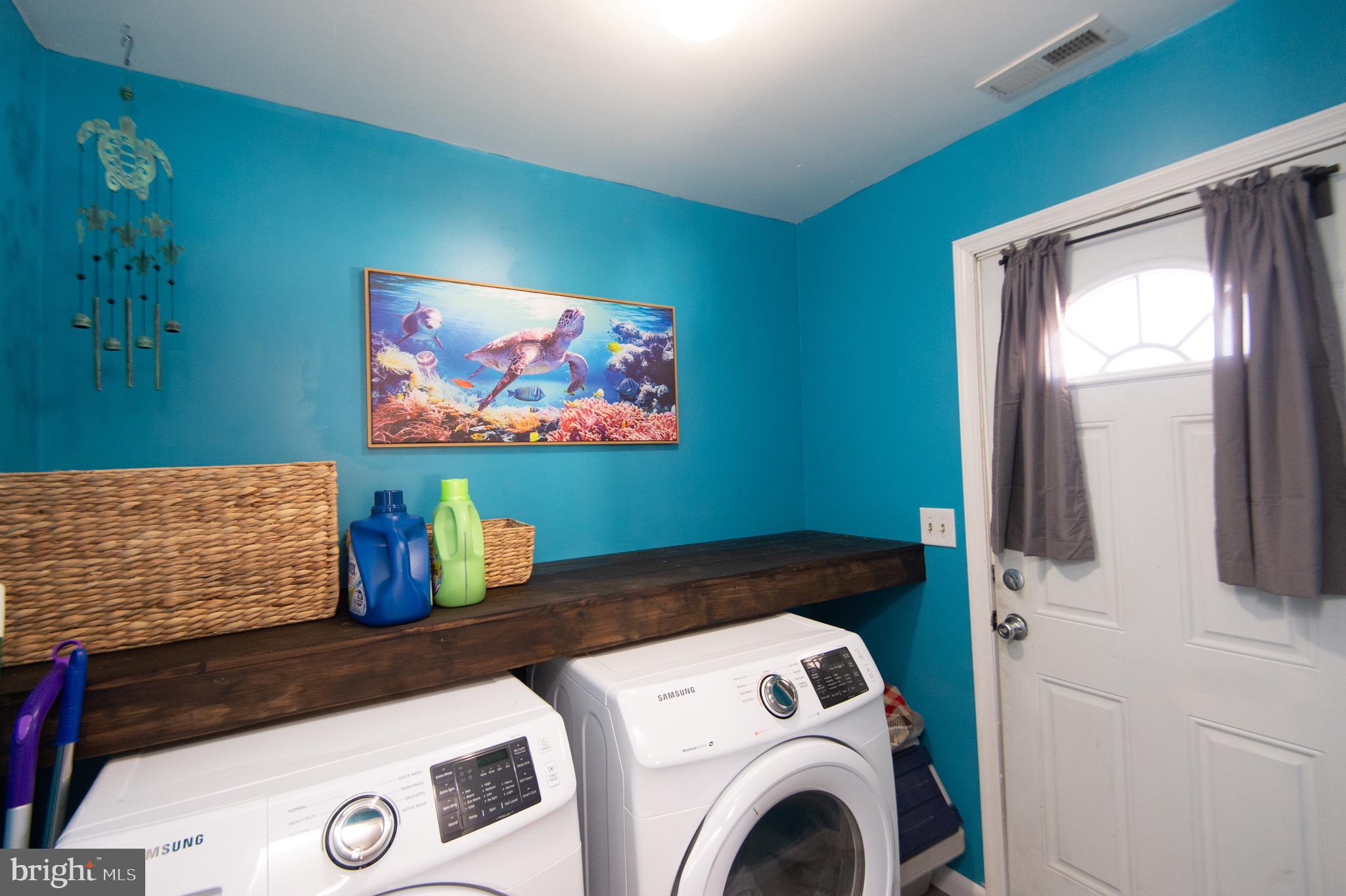 133 South Street Secretary, MD 21664 - Photo 14 of 39 a utility room with dryer and washer