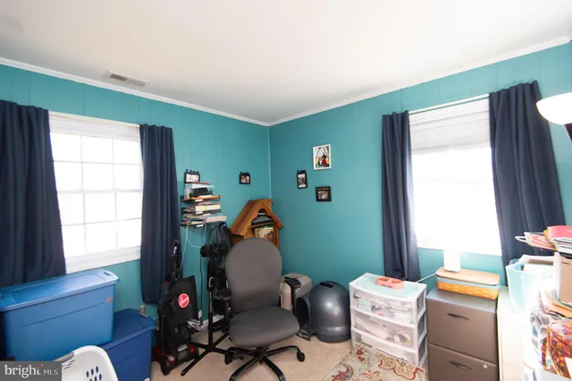 a room with furniture and a window