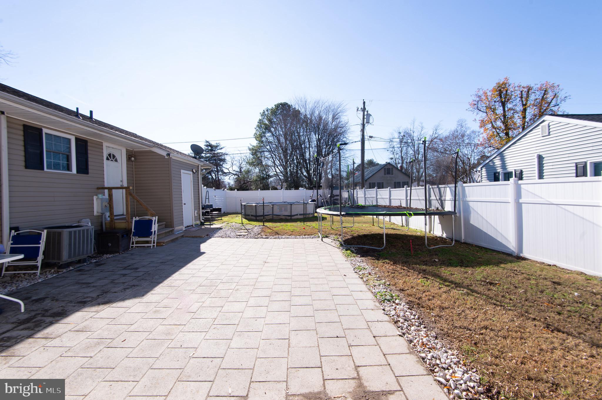 133 South Street Secretary, MD 21664 - Photo 26 of 39 a view of swimming pool with sitting area