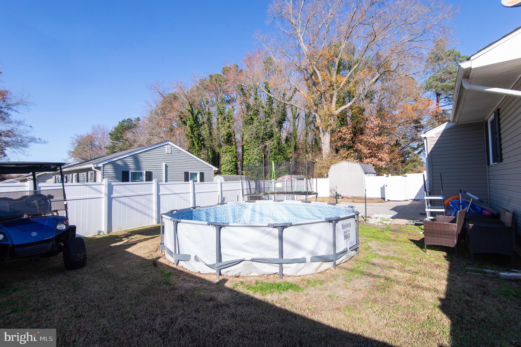 133 South Street Secretary, MD 21664 - Photo 29 of 39 a view of a house with a chairs in patio