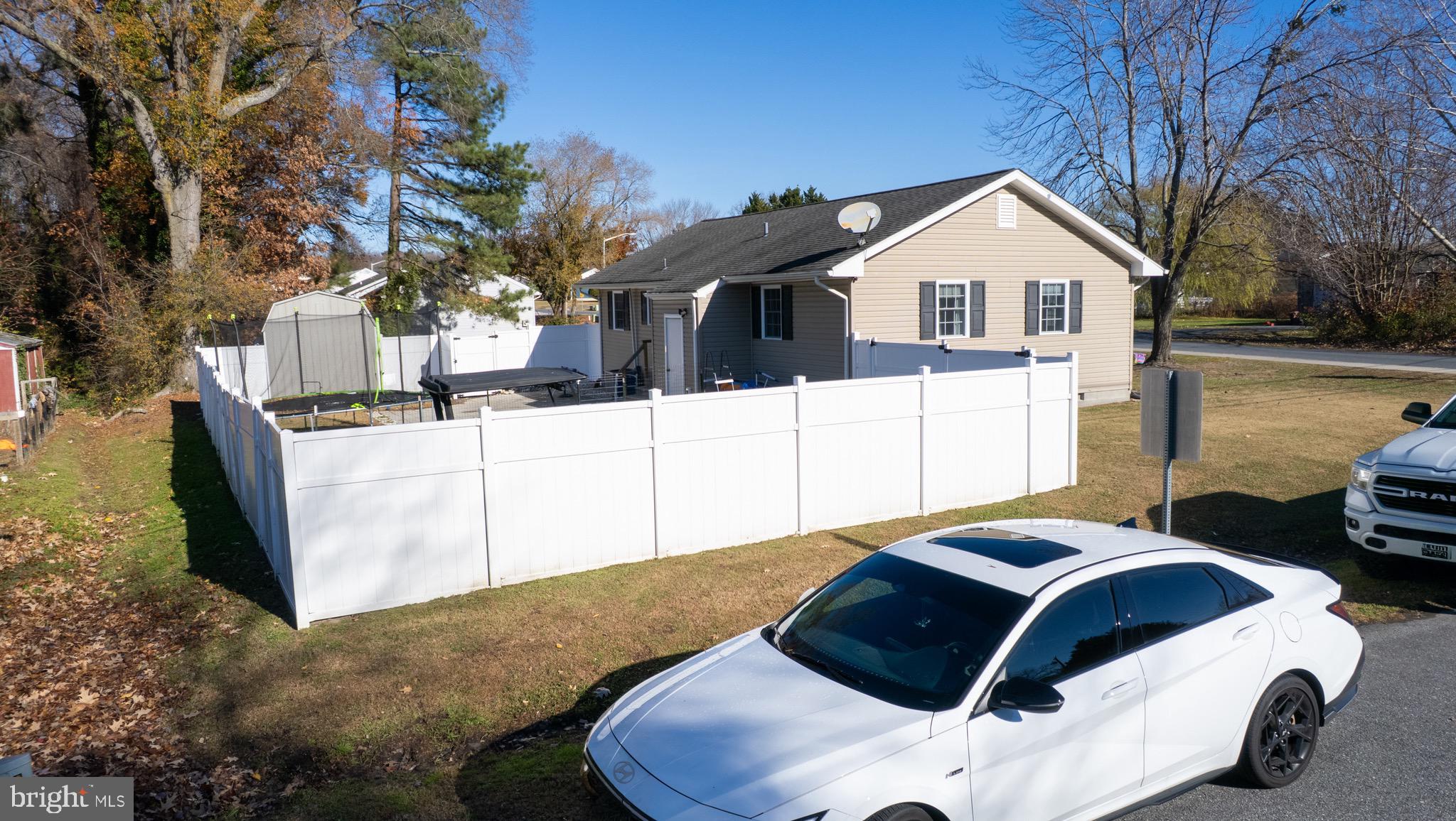 133 South Street Secretary, MD 21664 - Photo 31 of 39 a white house that has tree in front of it