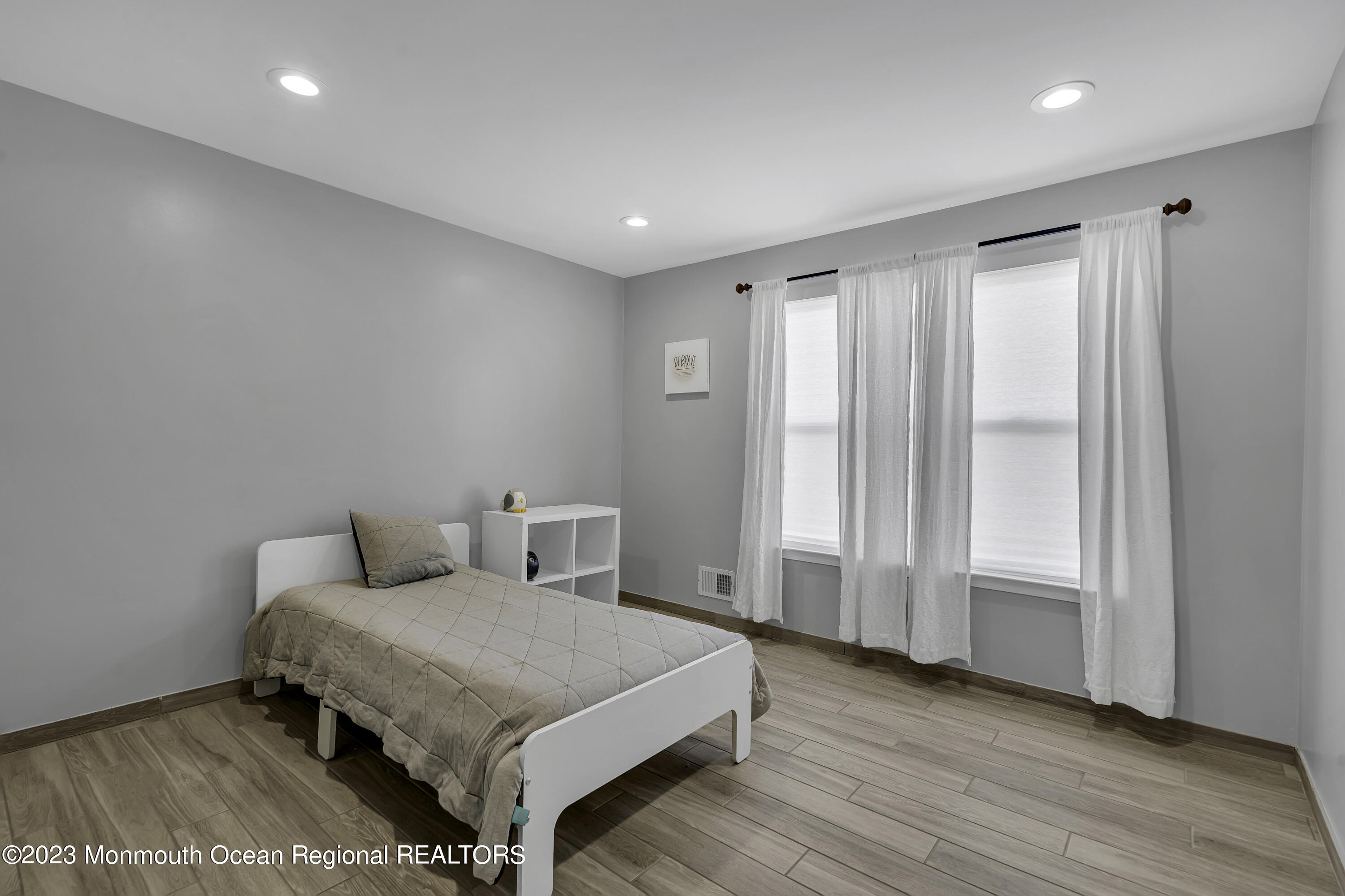 40 Netty Street Howell, NJ 07731 - Photo 23 of 41 a bedroom with a bed and wooden floor