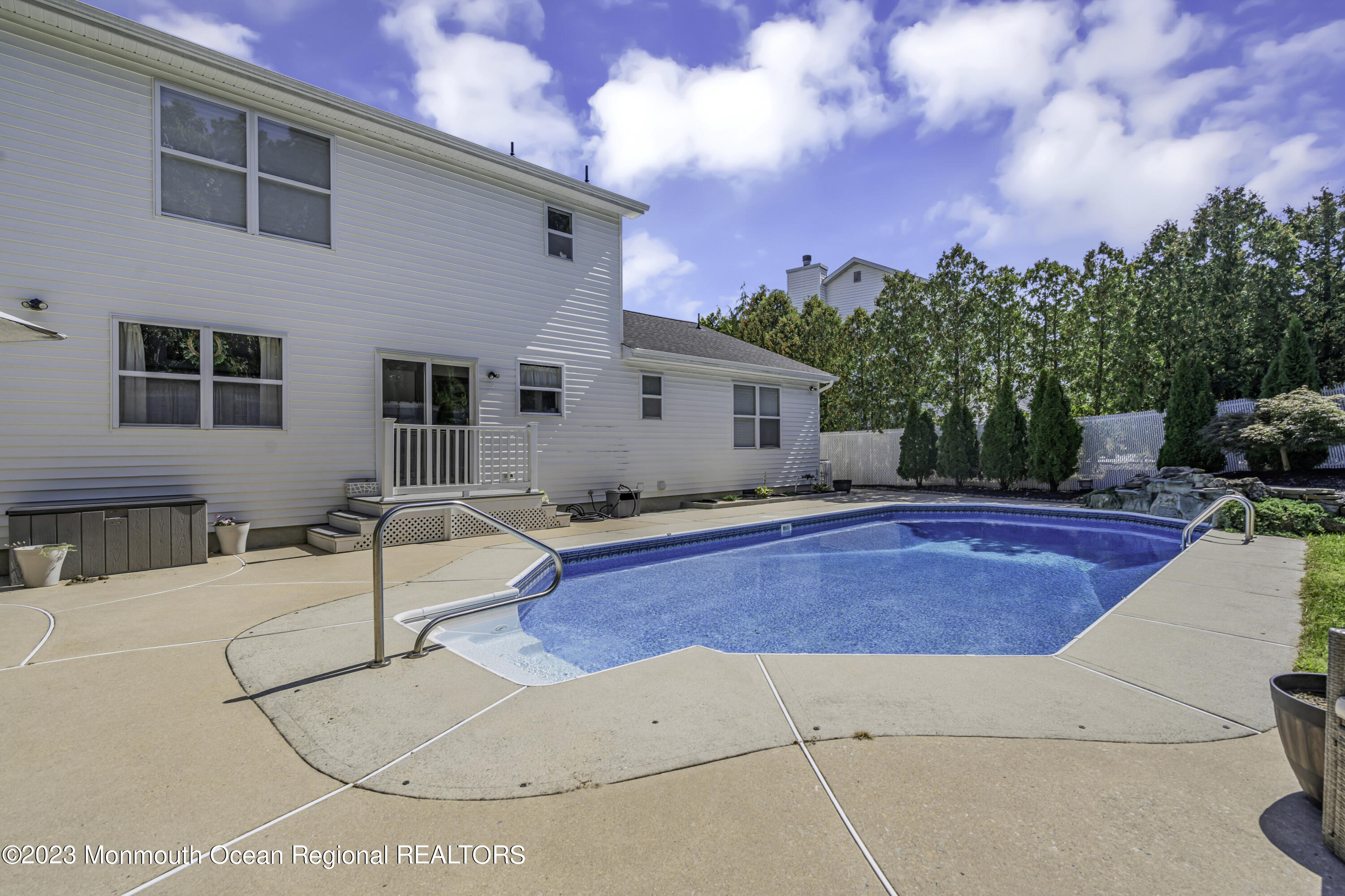 40 Netty Street Howell, NJ 07731 - Photo 40 of 41 a view of a house with swimming pool and sitting area