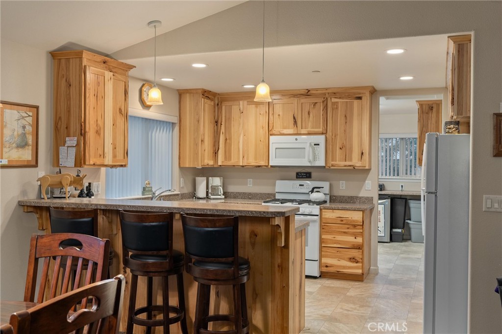7528 Humboldt Road Butte Meadows, CA 95942 - Photo 12 of 41 a kitchen with a sink stove and cabinets