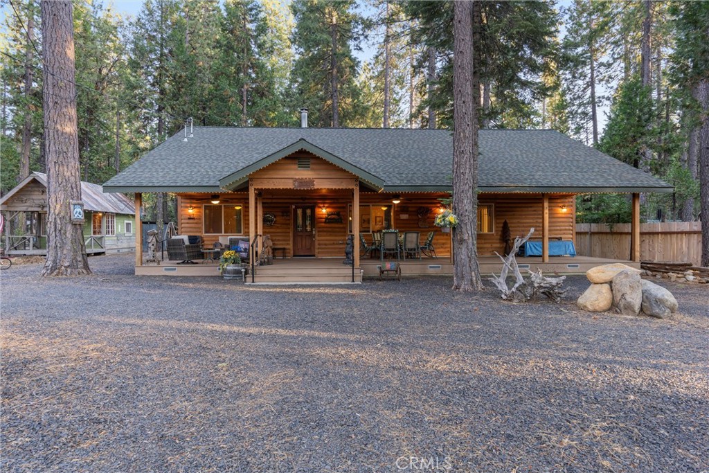 7528 Humboldt Road Butte Meadows, CA 95942 - Photo 3 of 41 a view of a town with large trees and large tree