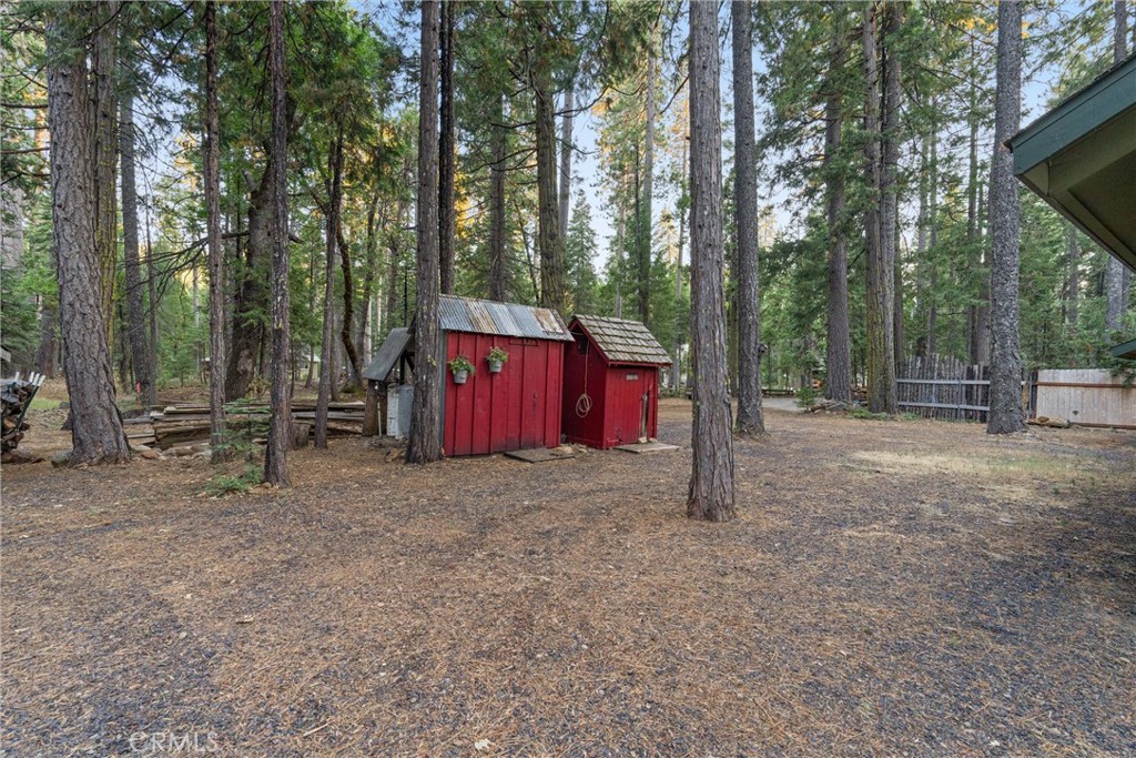 7528 Humboldt Road Butte Meadows, CA 95942 - Photo 33 of 41 a fire hydrant in the middle of a forest
