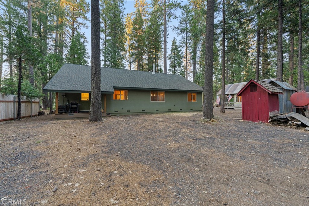 7528 Humboldt Road Butte Meadows, CA 95942 - Photo 35 of 41 a view of a house with backyard and a tree