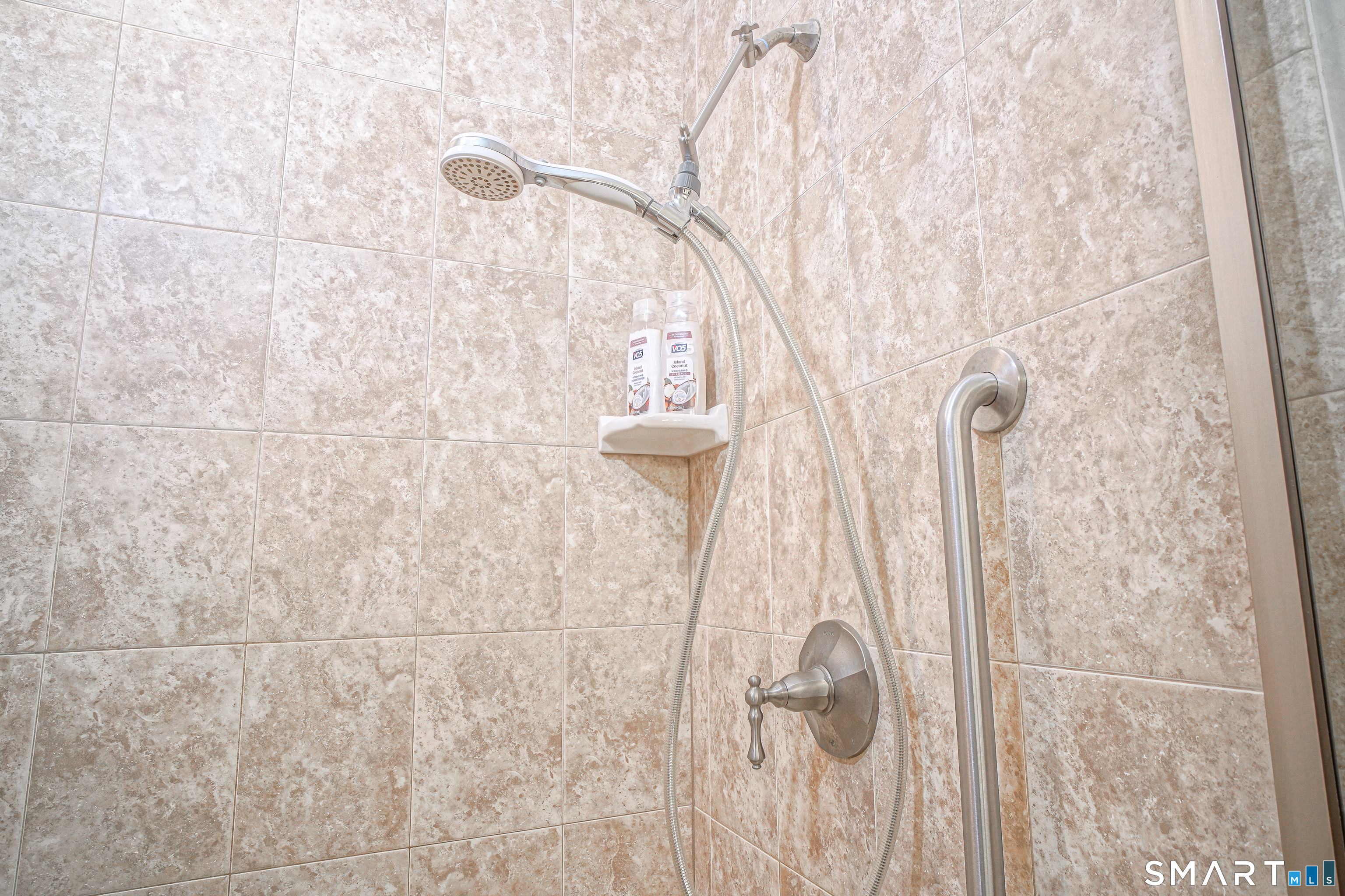 6 Lilac Lane, Unit 6 Prospect, CT 06712 - Photo 18 of 40 Glass doors to a walk-in tiled shower with upgraded faucet