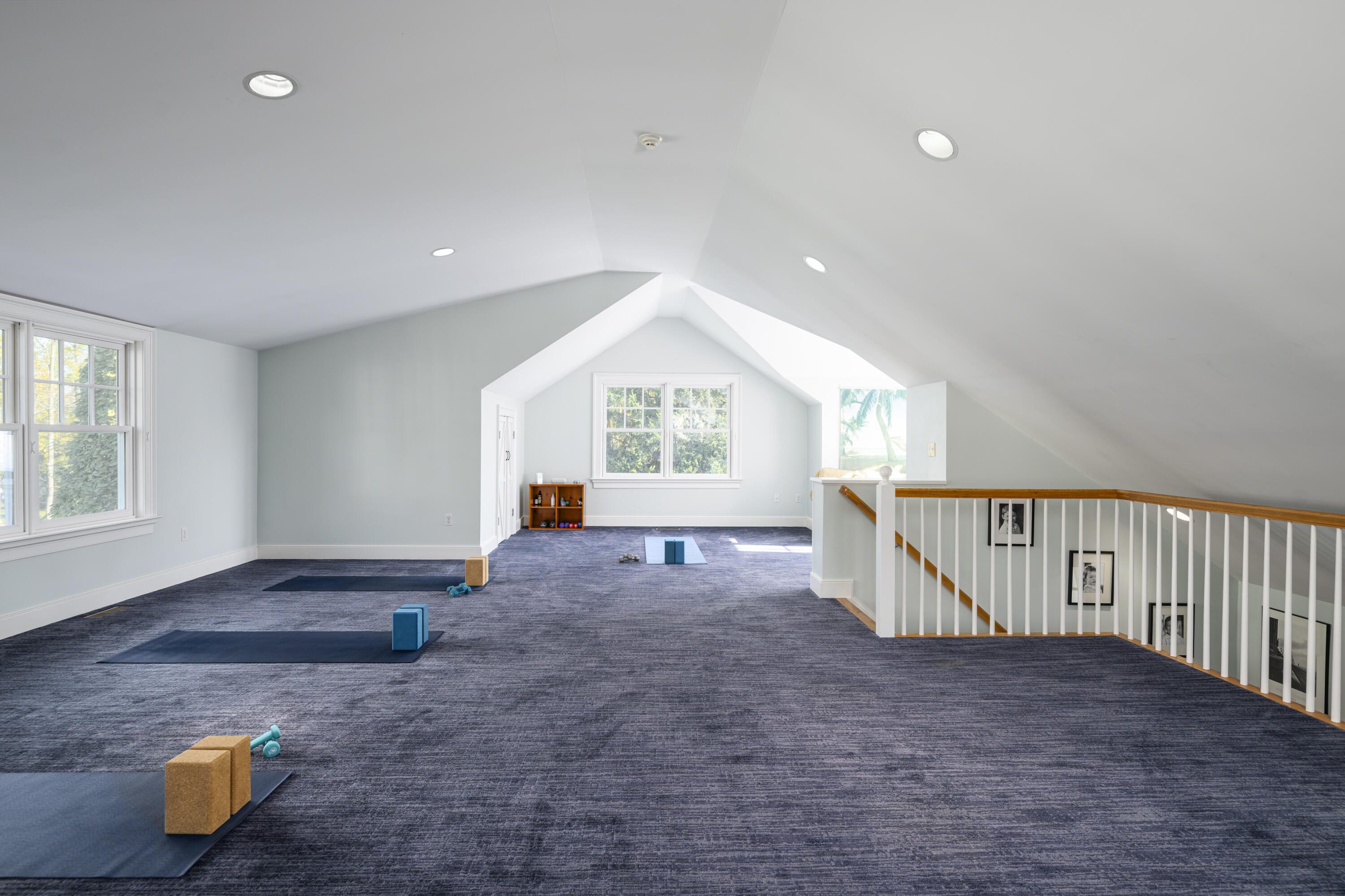1022 Silvermine Road New Canaan, CT 06840 - Photo 17 of 25 a view of an empty room with wooden floor and window