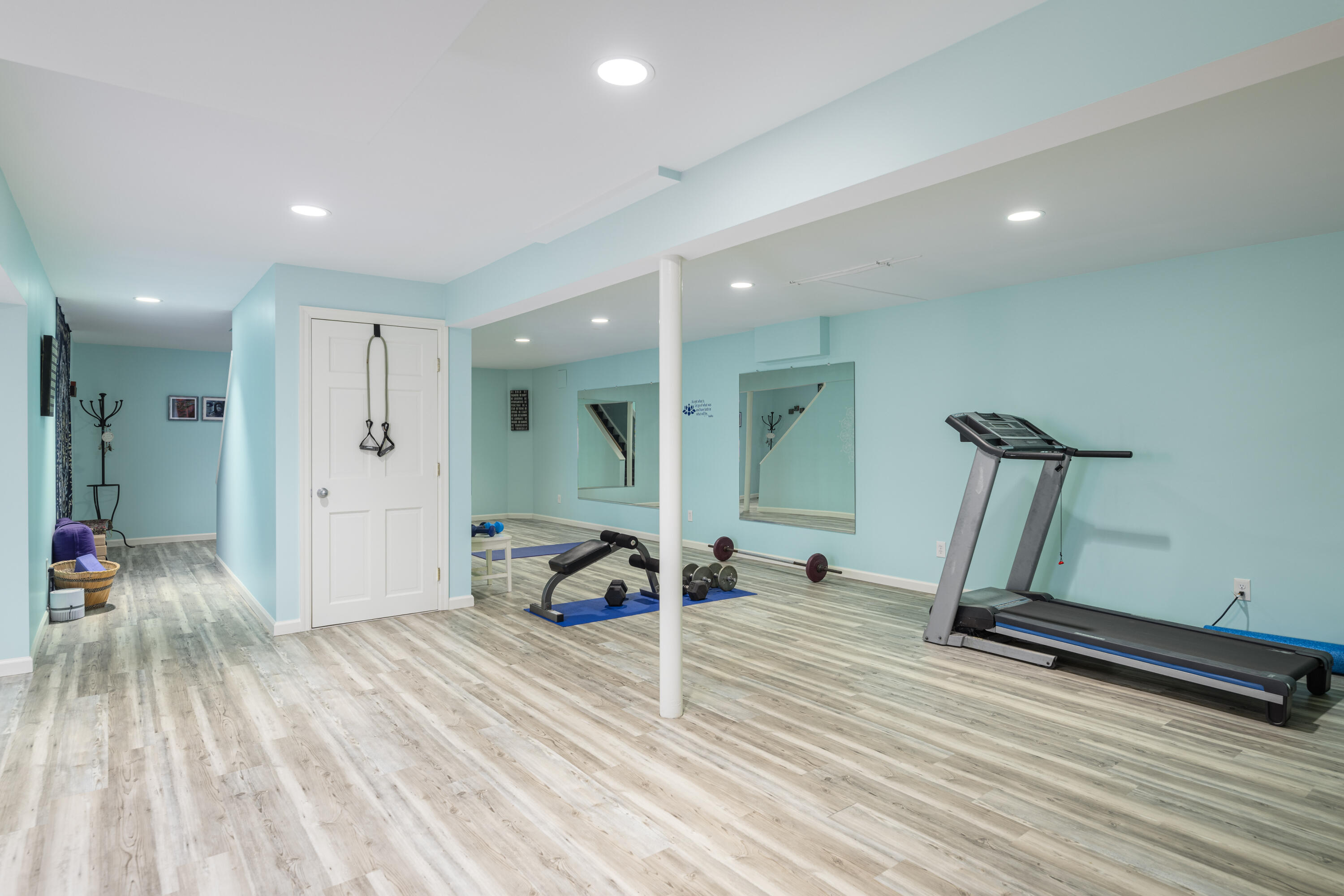 1022 Silvermine Road New Canaan, CT 06840 - Photo 20 of 25 a view of a room with gym equipment