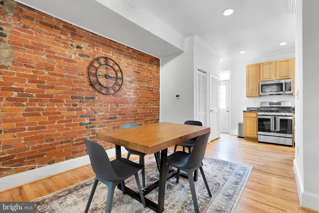 a view of a dining room with furniture