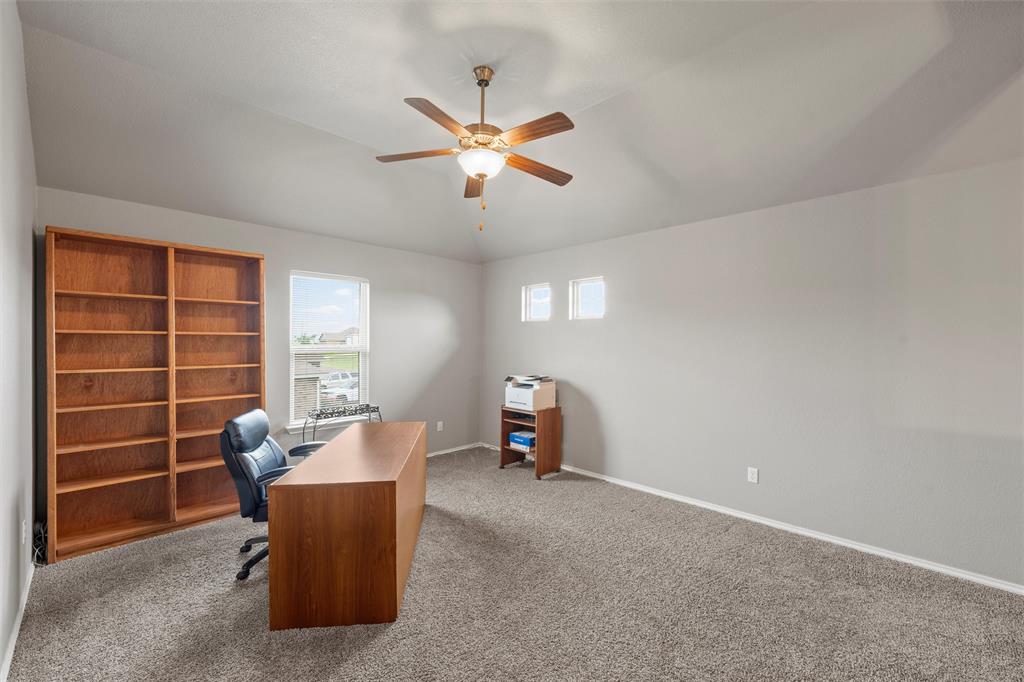 202 Milky Way Road Bruceville, TX 76630 - Photo 24 of 39 a living room with furniture and a window