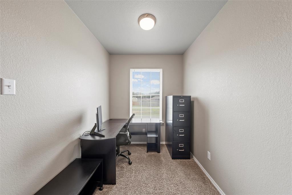 202 Milky Way Road Bruceville, TX 76630 - Photo 26 of 39 a room with furniture and a window