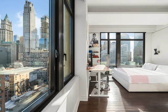 a view of a chairs on the roof deck
