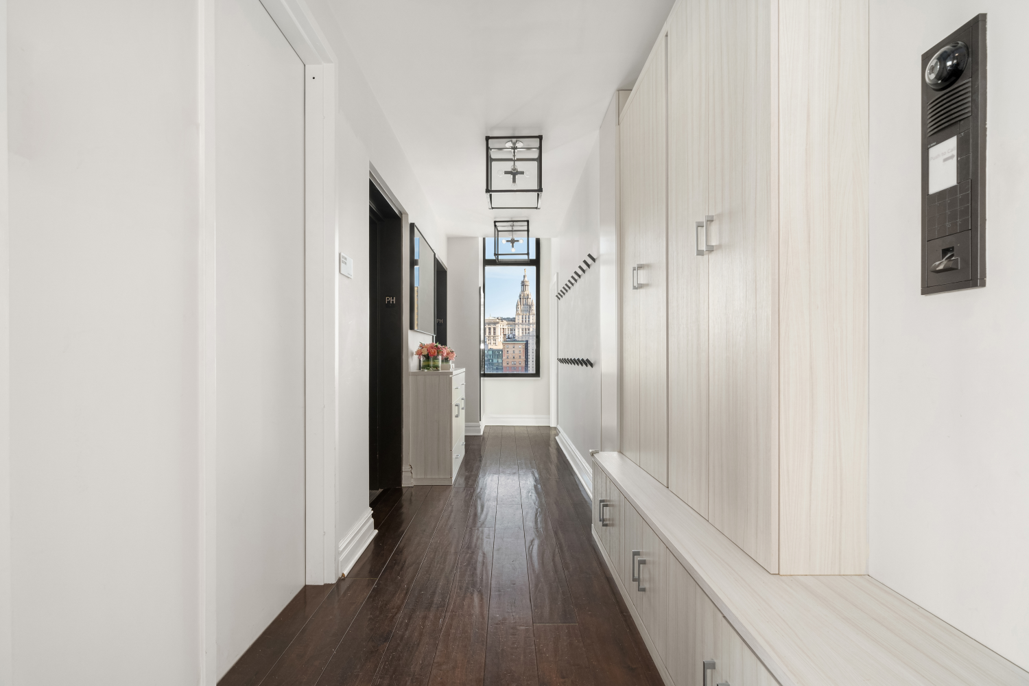 143 Reade Street, Unit PH Manhattan, NY 10013 - Photo 6 of 30 a view of hallway with wooden floor