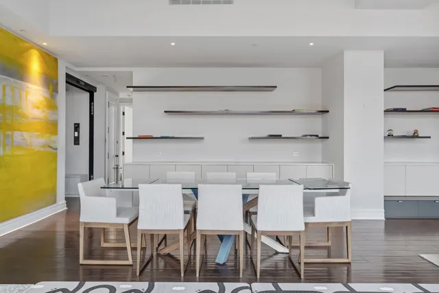 a view of hallway with wooden floor