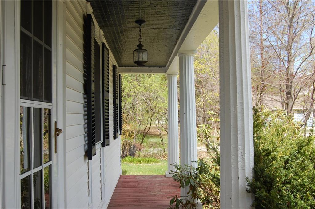Open front veranda to pass the...