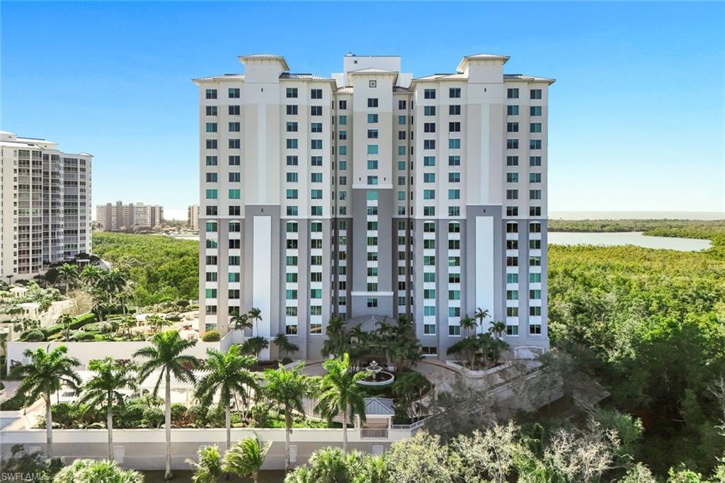 265 Indies Way, Unit T02 Naples, FL 34110 - Photo 2 of 38 a view of a city with tall buildings