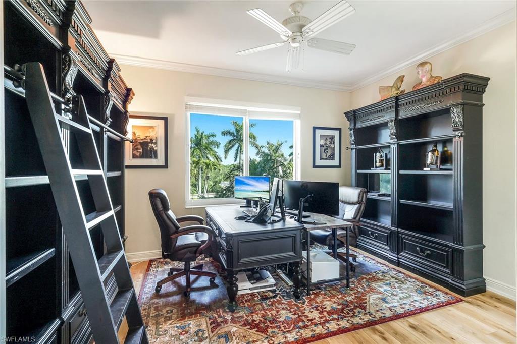 265 Indies Way, Unit T02 Naples, FL 34110 - Photo 23 of 38 a work room with furniture