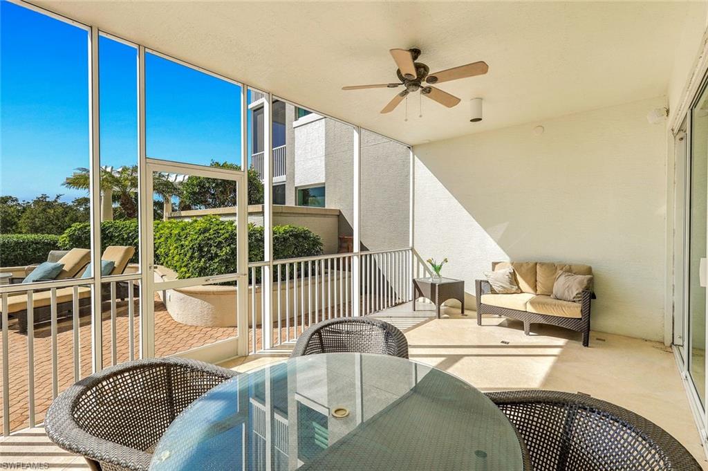 265 Indies Way, Unit T02 Naples, FL 34110 - Photo 26 of 38 a living room with furniture