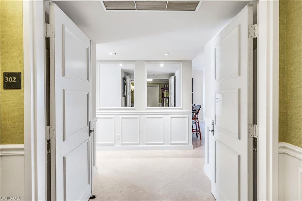 265 Indies Way, Unit T02 Naples, FL 34110 - Photo 3 of 38 a view of front door