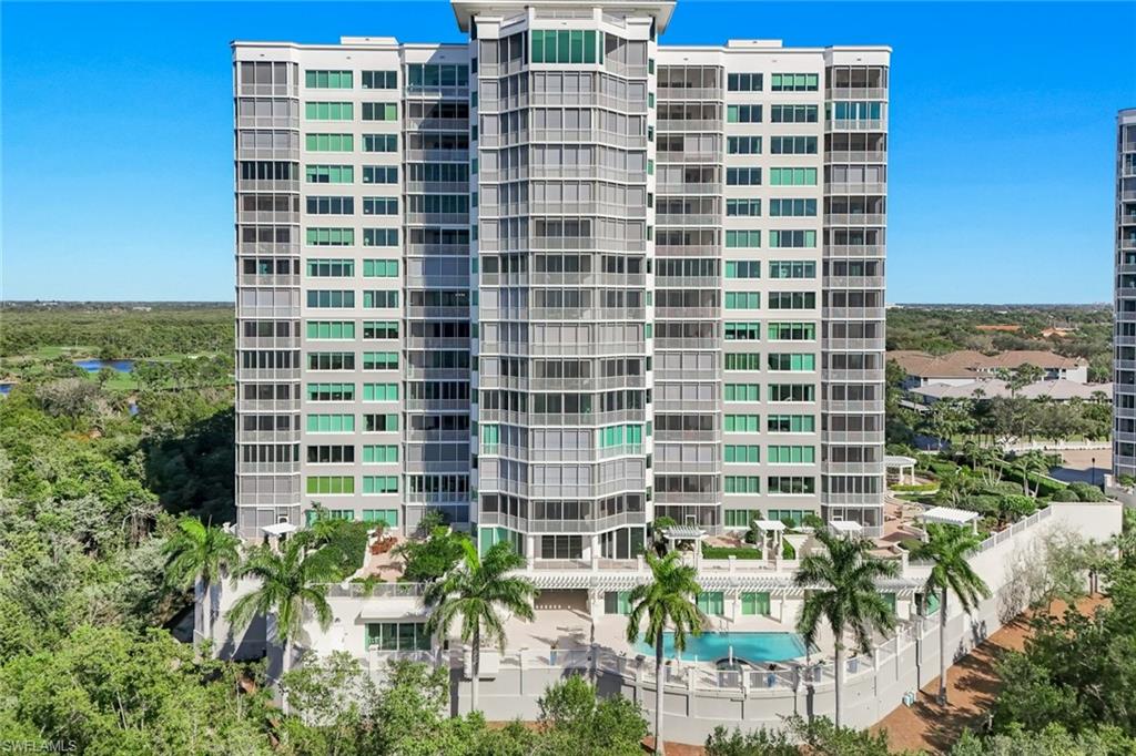 265 Indies Way, Unit T02 Naples, FL 34110 - Photo 33 of 38 a front view of a building