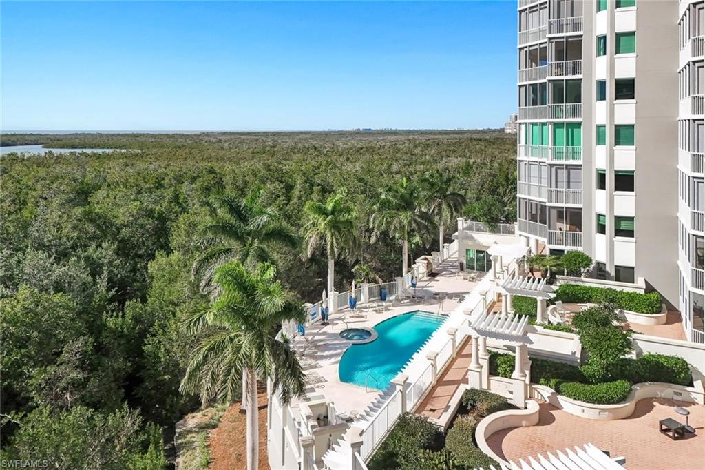 265 Indies Way, Unit T02 Naples, FL 34110 - Photo 34 of 38 a view of a city with tall buildings