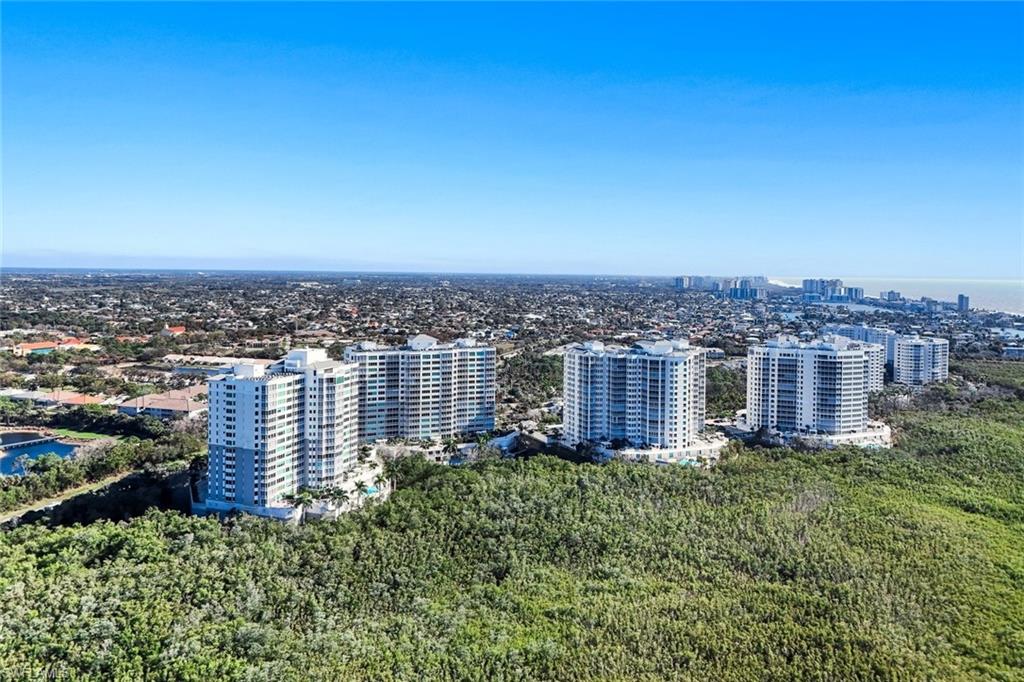 265 Indies Way, Unit T02 Naples, FL 34110 - Photo 36 of 38 an aerial view of multiple house