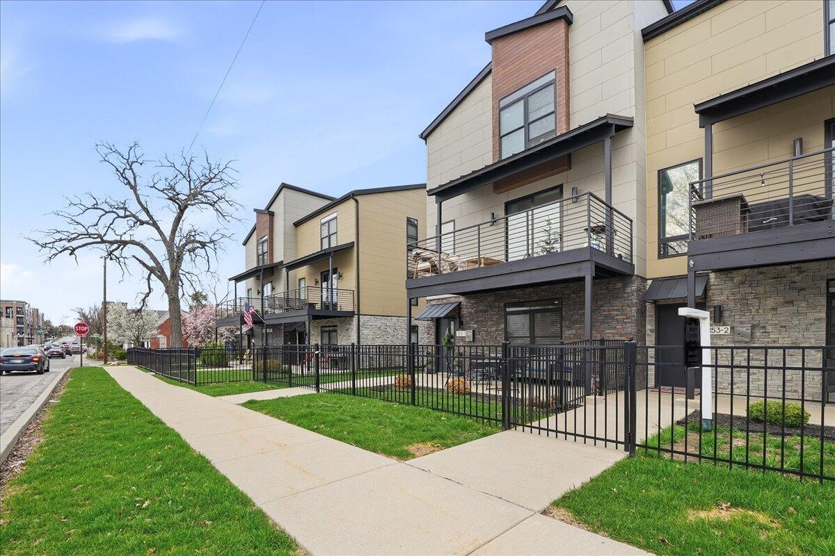153 Morgan Boulevard, Unit 1 Valparaiso, IN 46383 - Photo 3 of 29 a view of a house and a yard