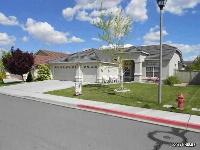 1270 El Monte Court Reno, NV 89521 - Photo 1 of 1 a view of a house with a big yard and large tree