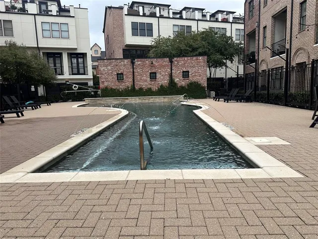 a car parked in front of a house