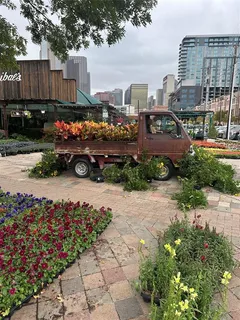 a view of a house with a backyard porch and sitting area