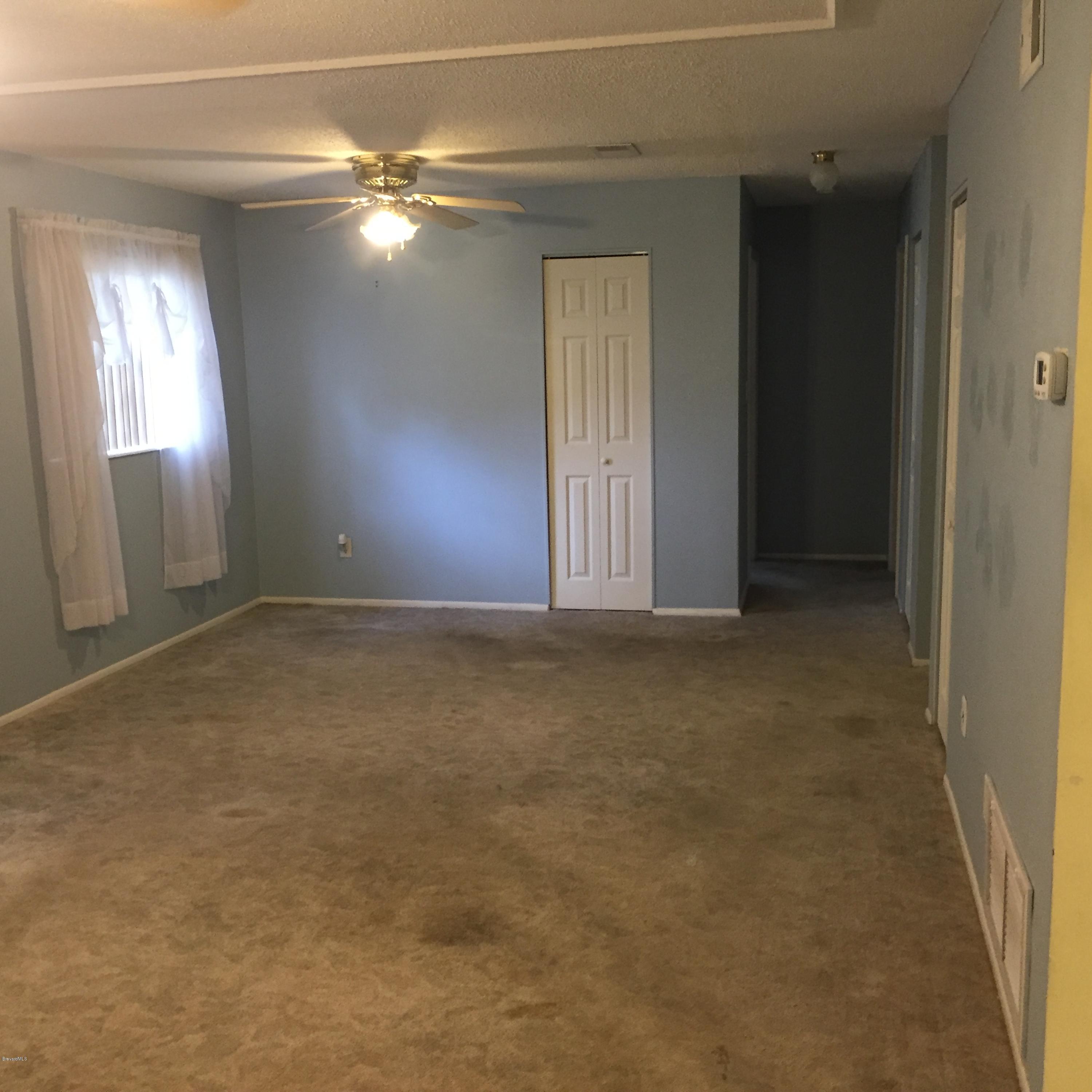 2860 Rheims Avenue Melbourne, FL 32935 - Photo 16 of 22 Living Room
