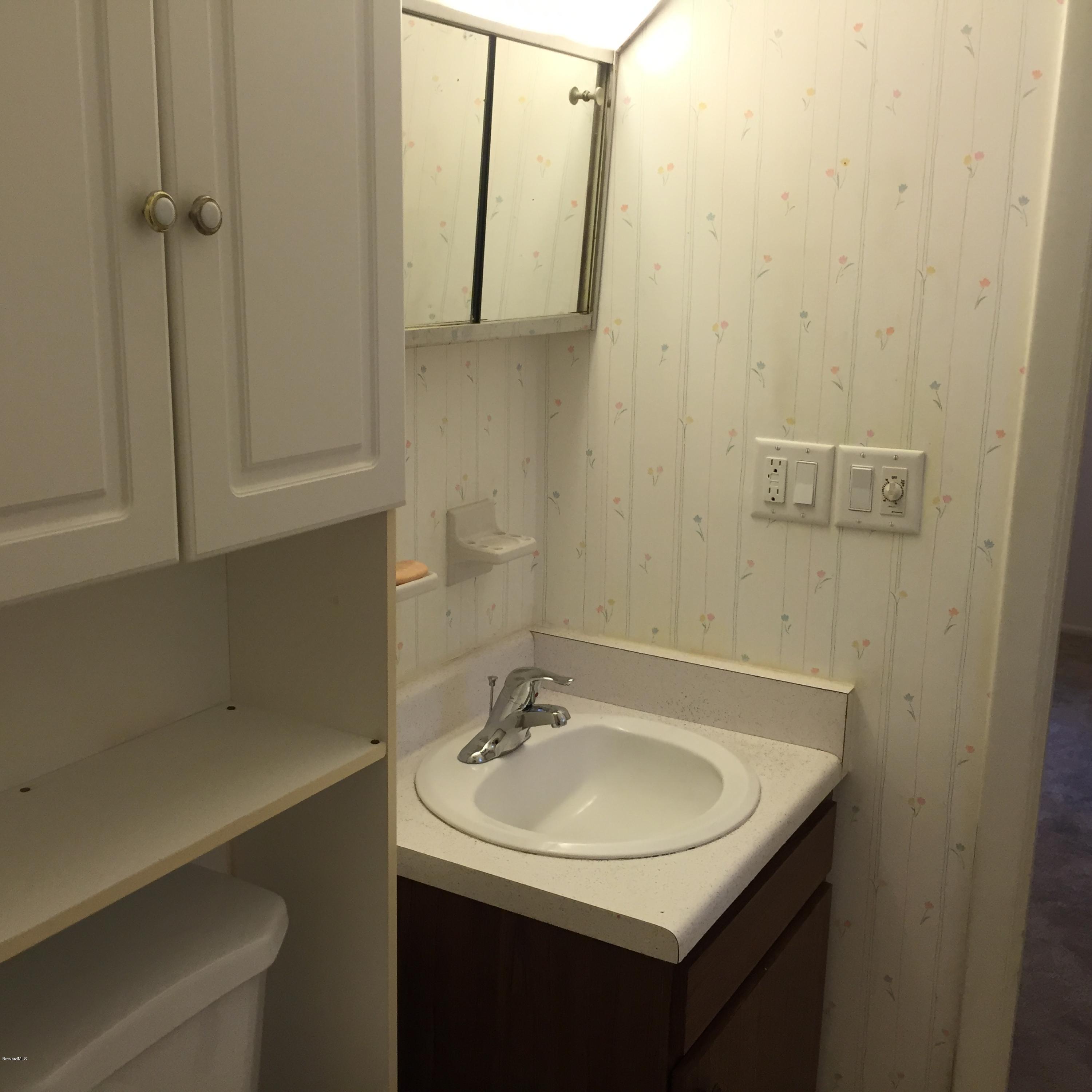 2860 Rheims Avenue Melbourne, FL 32935 - Photo 18 of 22 Hall Bath