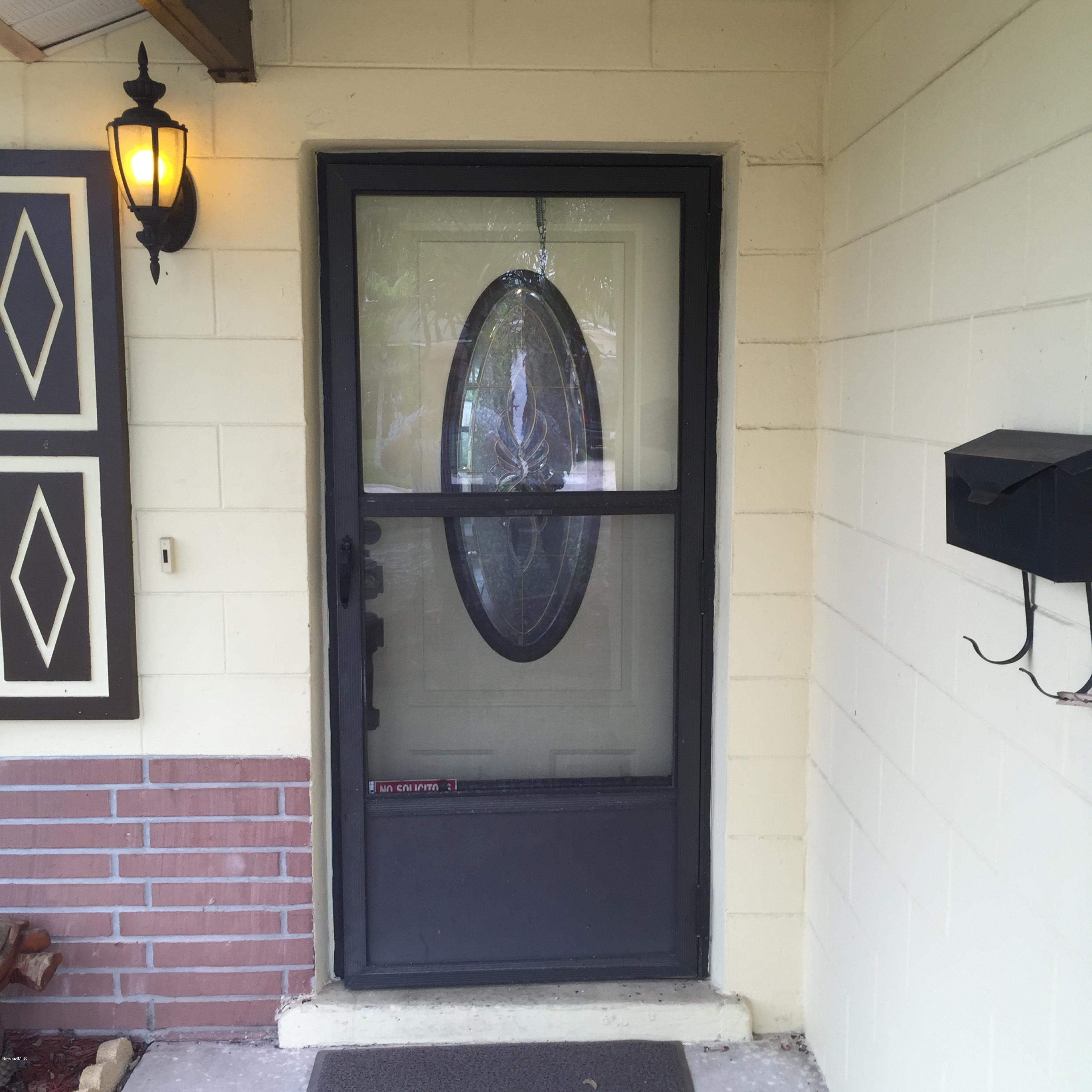 2860 Rheims Avenue Melbourne, FL 32935 - Photo 21 of 22 Covered Entry