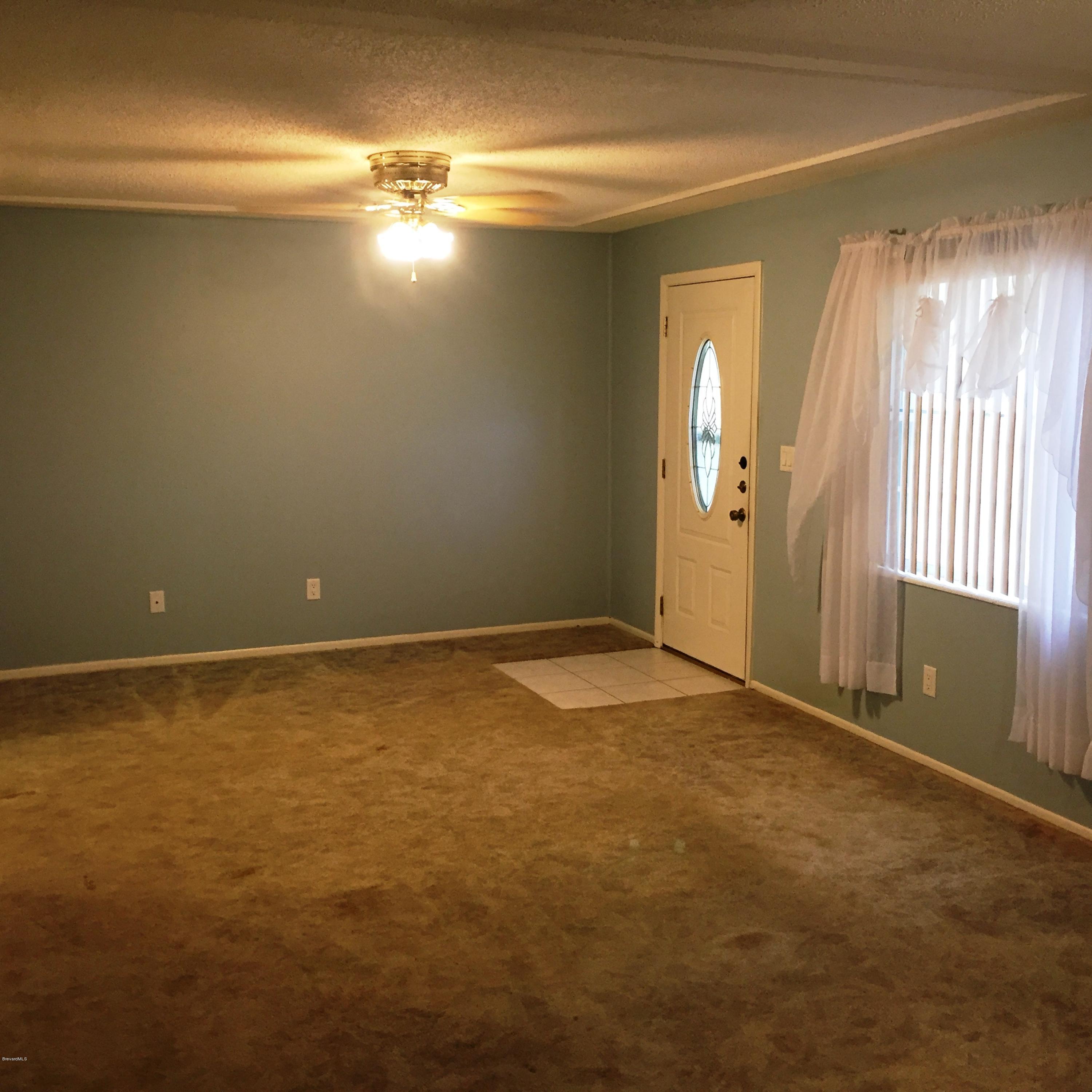 2860 Rheims Avenue Melbourne, FL 32935 - Photo 4 of 22 Living Room