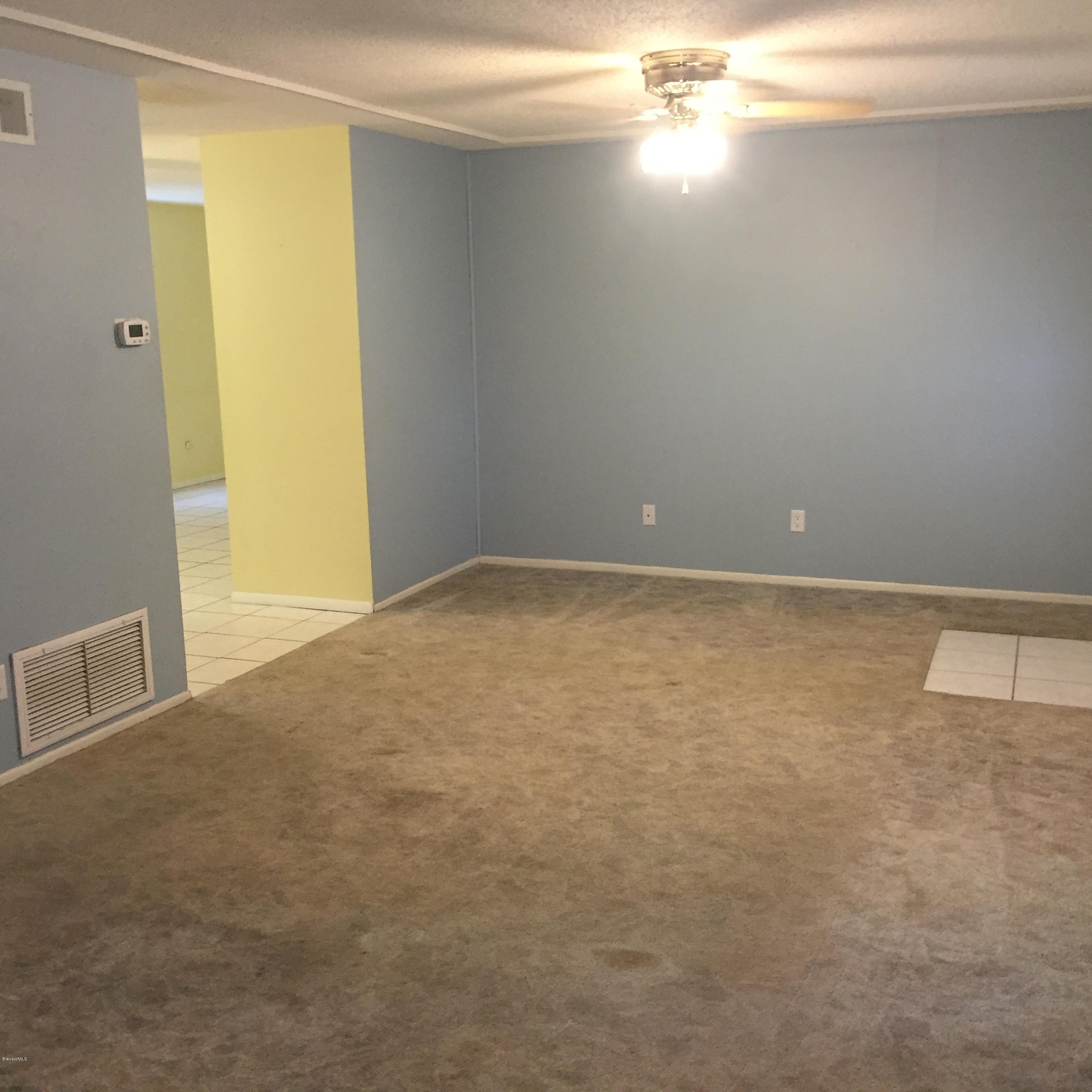 2860 Rheims Avenue Melbourne, FL 32935 - Photo 5 of 22 Living Room