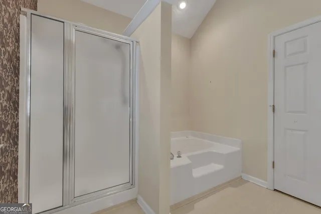 a bathroom with bathtub