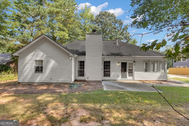 a house view with a garden space
